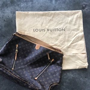 Authentic Should bag by Louis Vuitton.